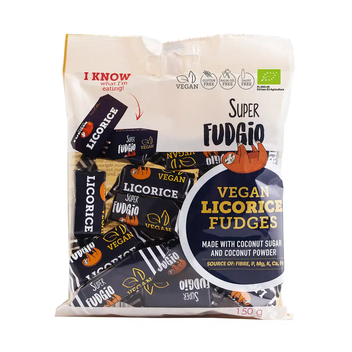 Wegańskie krówki bezmleczne o smaku lukrecji <b>150 g / d.10</b> 1 ekologiczne krówki bezmleczne o smaku lukrecji; foliowe kremowe opakowane z krówkami w ciemnogranatowym papierku, przezroczyste okienko przez które widać zawartość, logo super fudgio