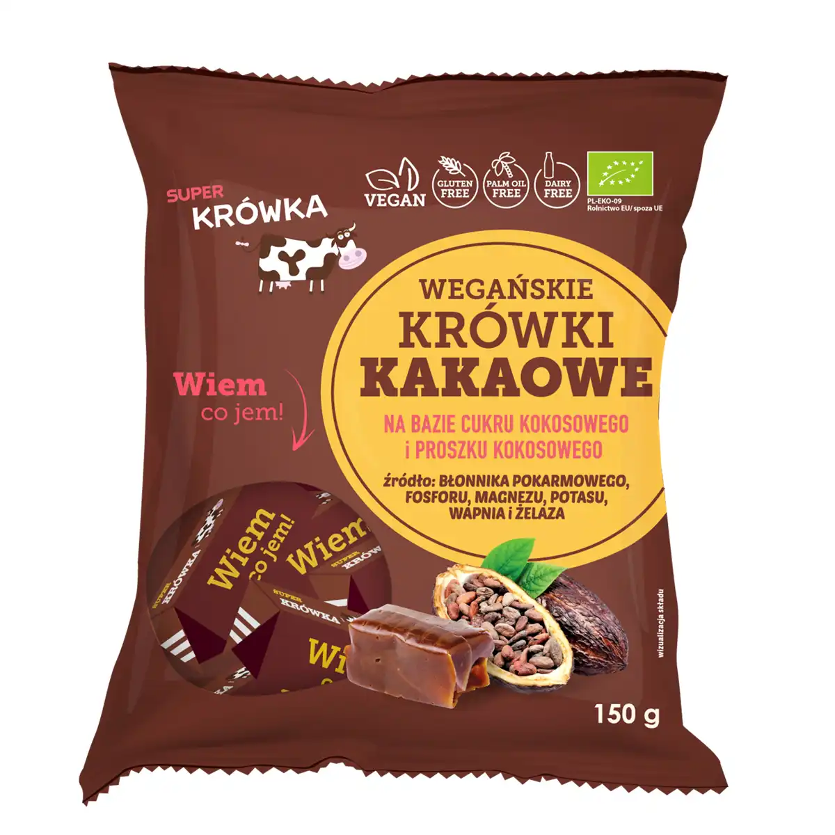 Super Fudgio Zestaw Prezentowy 660g 4 krówki bezmleczne kakaowe; foliowe opakowane w kolorze brązu z żółtym kółkiem, z krówką i ziarnem kakaowca; przezroczyste okienko przez które widać zawartość, cukierki w brązowym papierku, logo super krówka